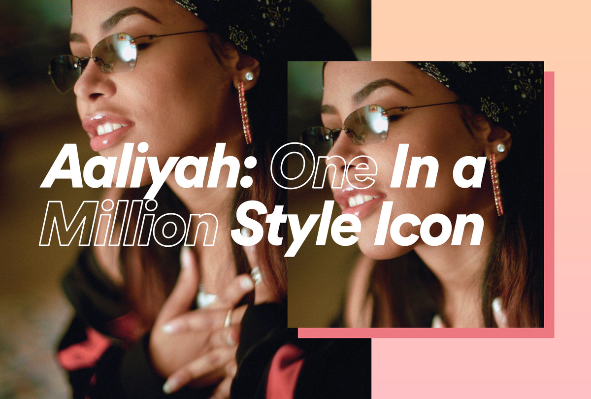Aaliyah wearing her signature long side-swept hair and dark sunglasses