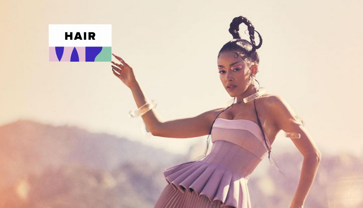 Doja Cat wearing a dramatic sculpted hairstyle at an event