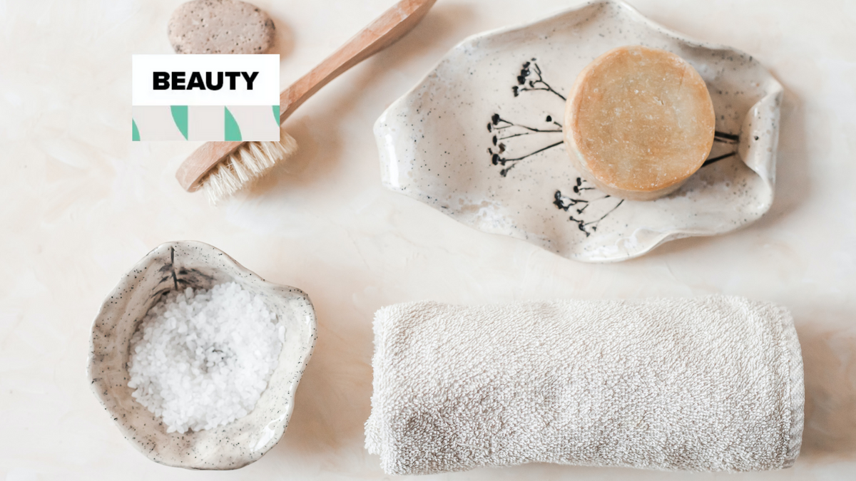 Epsom salt poured into a warm bath for a wellness soak