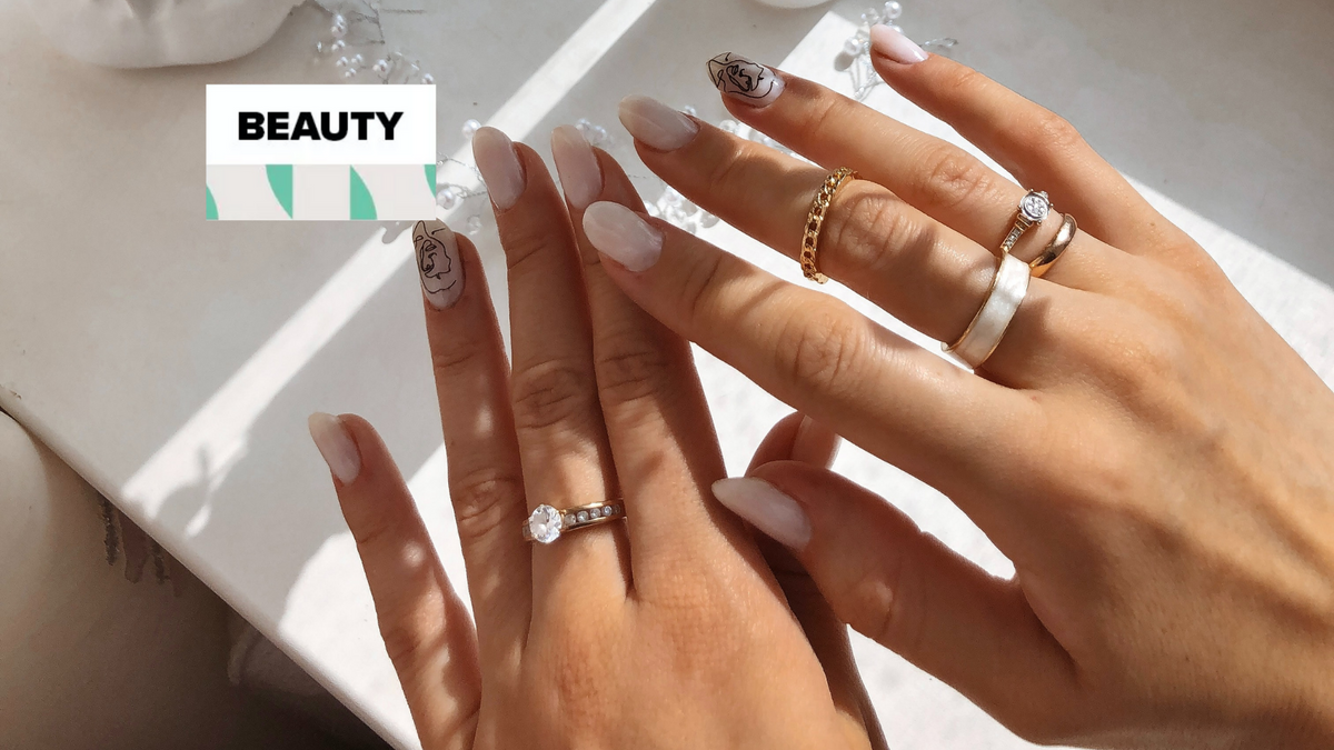 Nail technician performing a dry manicure without soaking the hands