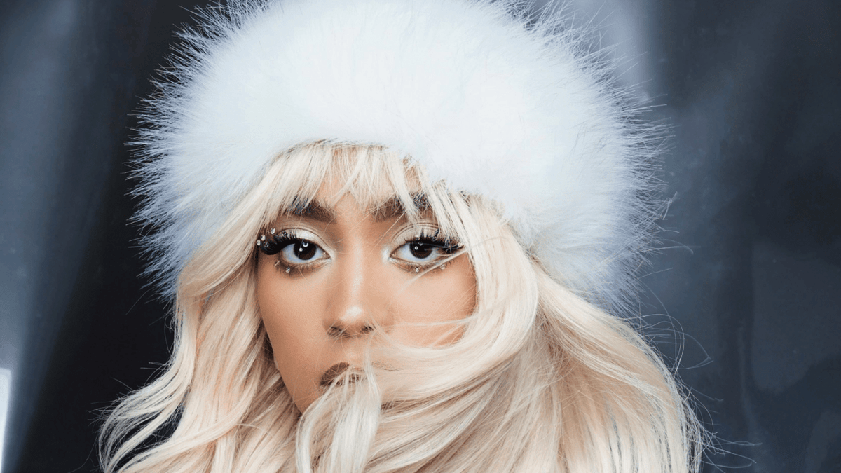 Winter hairstyle worn with a knit hat and coat in cold weather