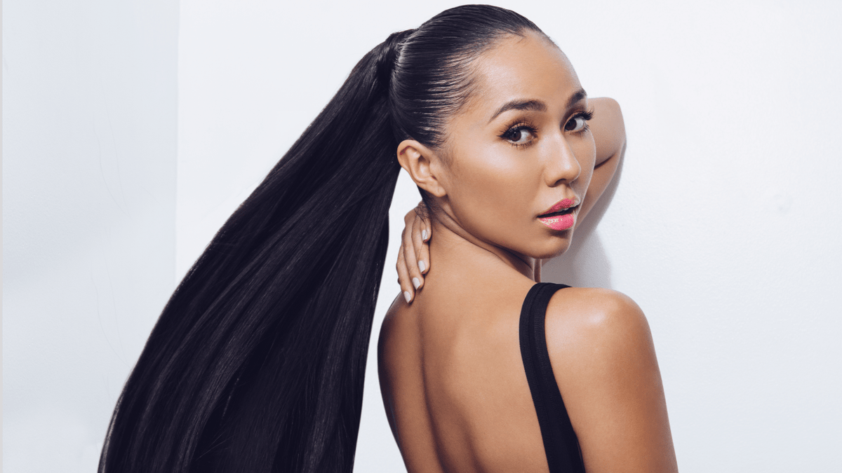 Long styled hairstyles created with human hair extensions on Black women
