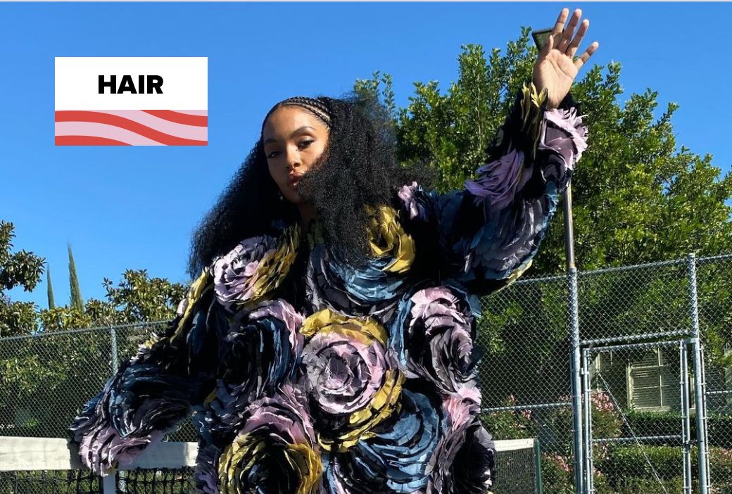 Yara Shahidi wearing her natural curls styled for a red carpet