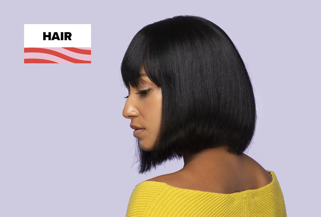 Sew-in bob styled blunt and sleek at chin length on a Black woman