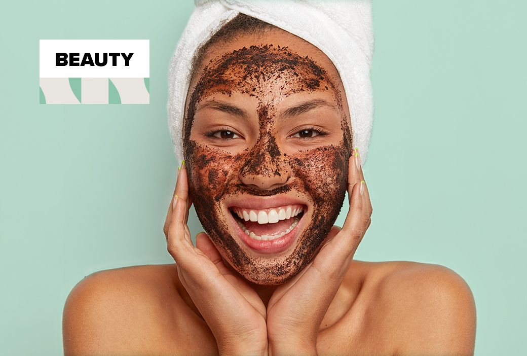 Ground coffee in a bowl beside a homemade skin scrub