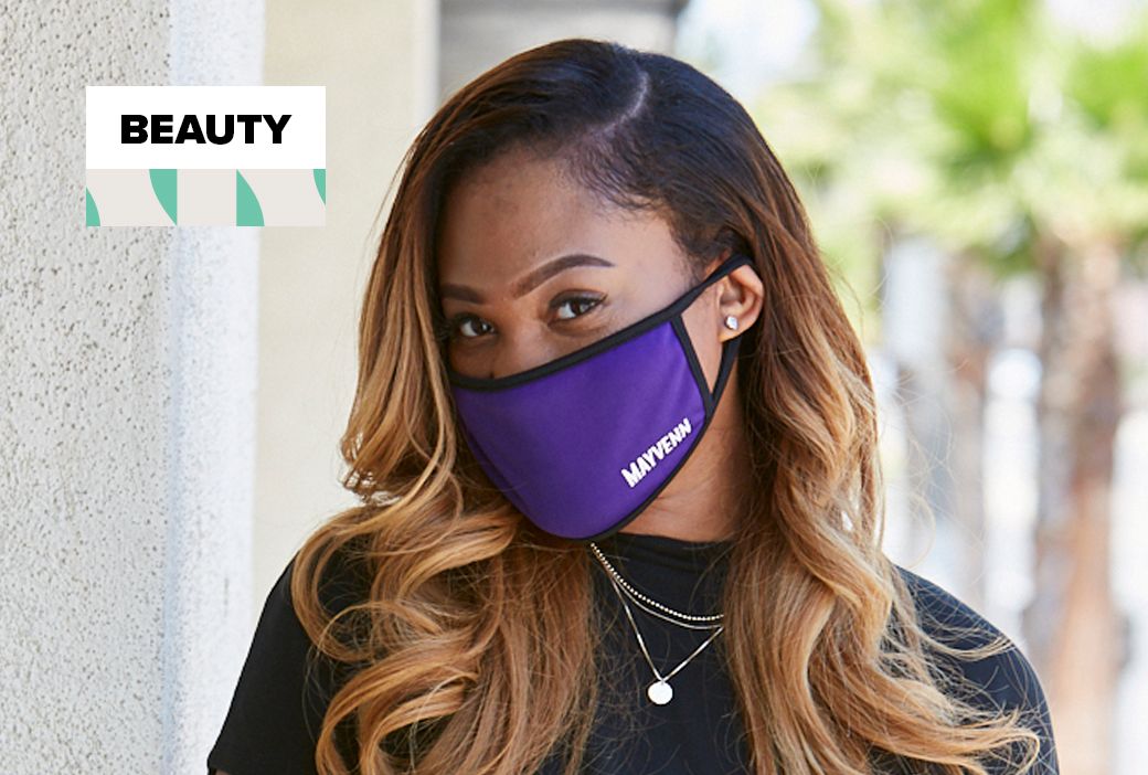 Woman wearing a face mask with irritated skin along her jawline