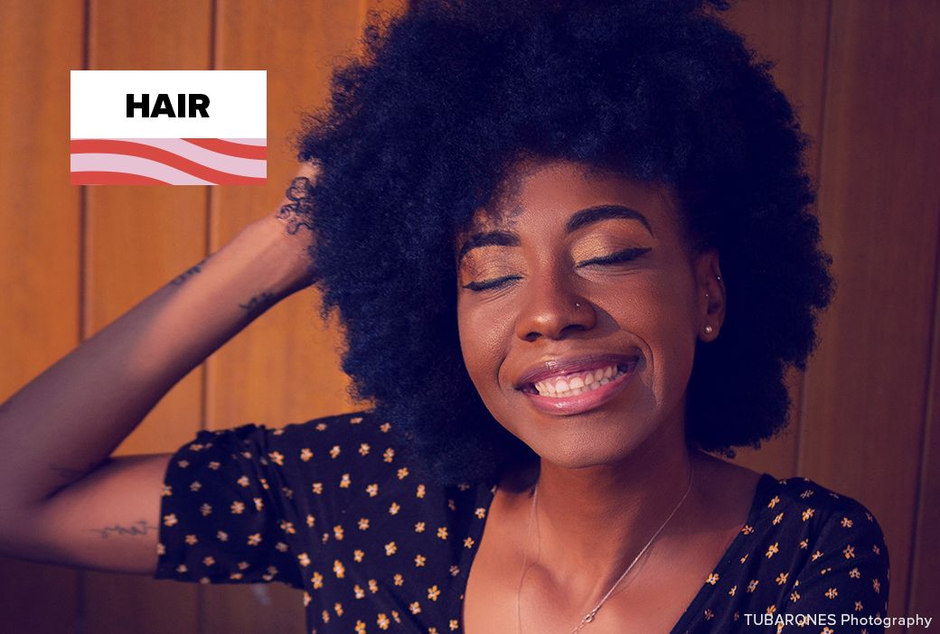 Kitchen ingredients like avocado and honey mixed for a DIY hair mask