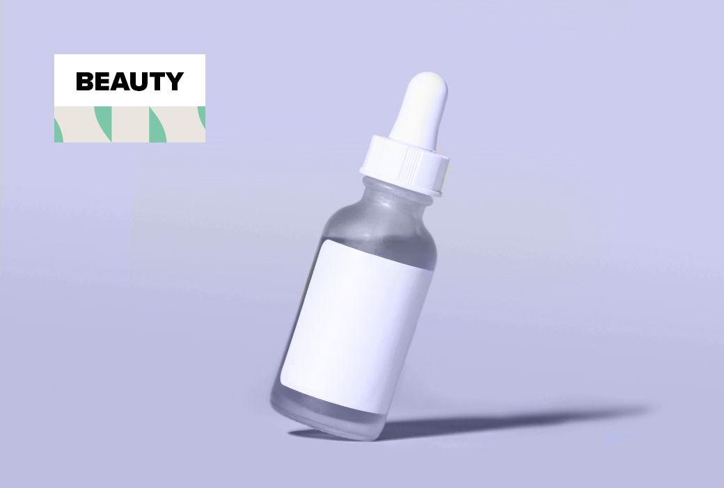 Hyaluronic acid serum being applied to a woman face with a dropper