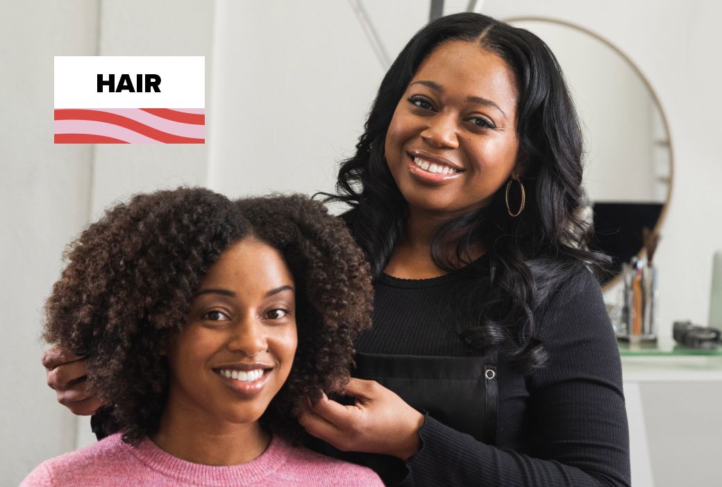 Client consulting with a hairstylist before booking an appointment