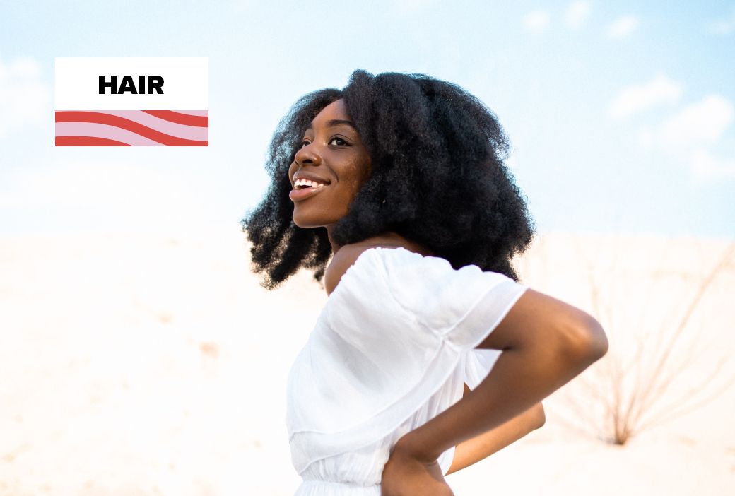 Shampoo and conditioner bottles selected for natural hair types