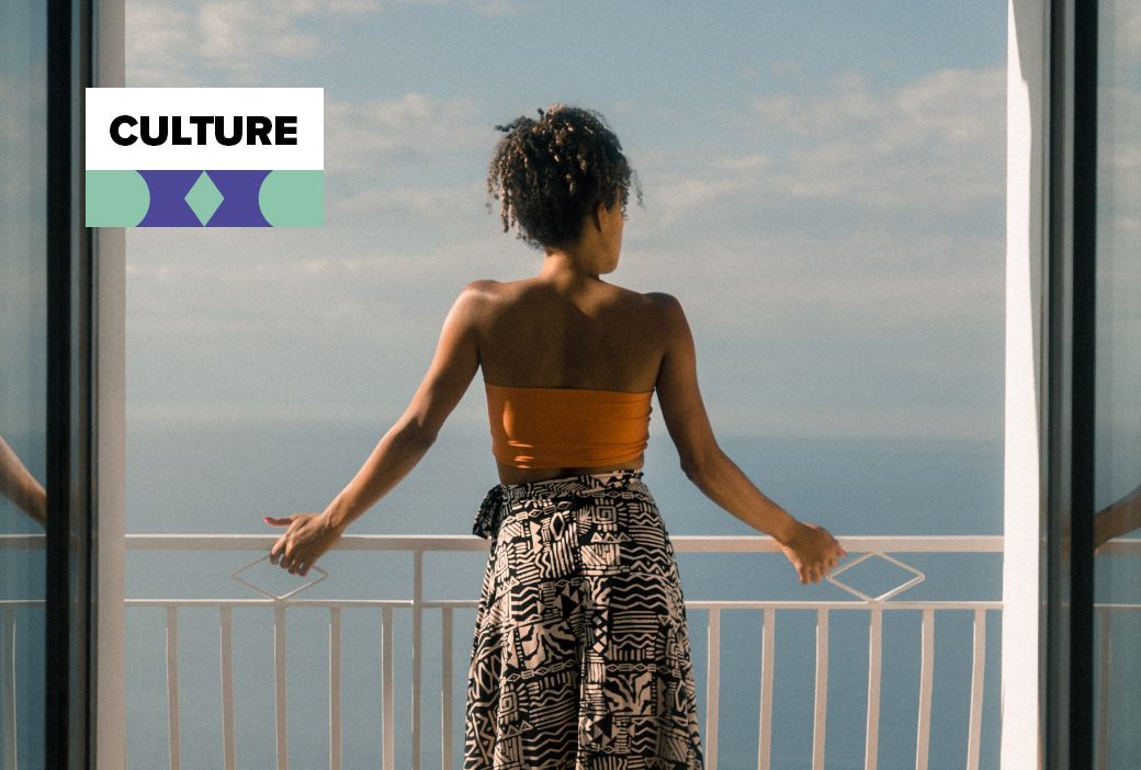 Traveler looking out over a scenic vacation destination