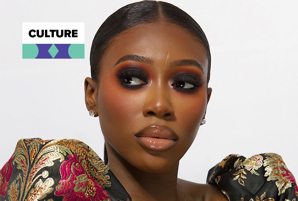 Makeup artist Vanessa Gyimah photographed with a finished full glam look