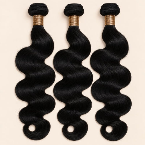 Three #1 jet black body wave human hair bundles standing side by side