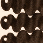Three #2 chocolate brown body wave wefts laid flat, showing the staggered lengths