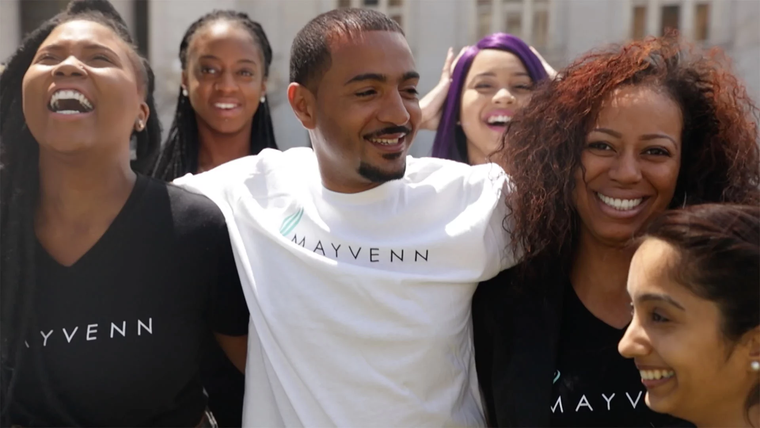 The Mayvenn team in branded shirts