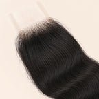 Narrow transparent lace parting space on a body wave 2x6 deep part closure