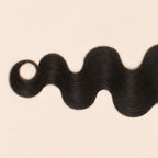 Body wave S-pattern on virgin human hair hand-tied into a 2x6 lace closure