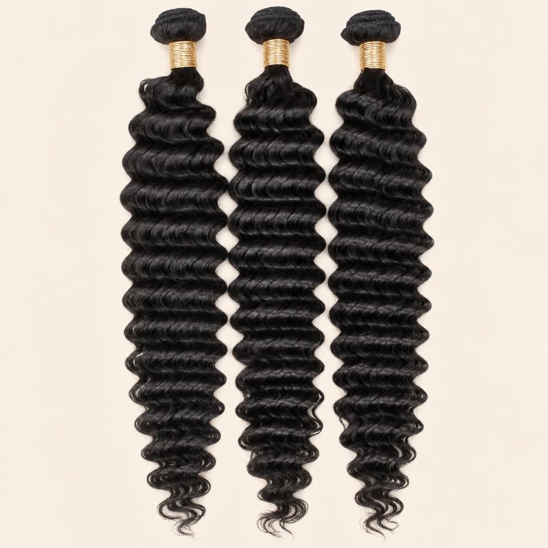 Three deep wave human hair bundles standing side by side