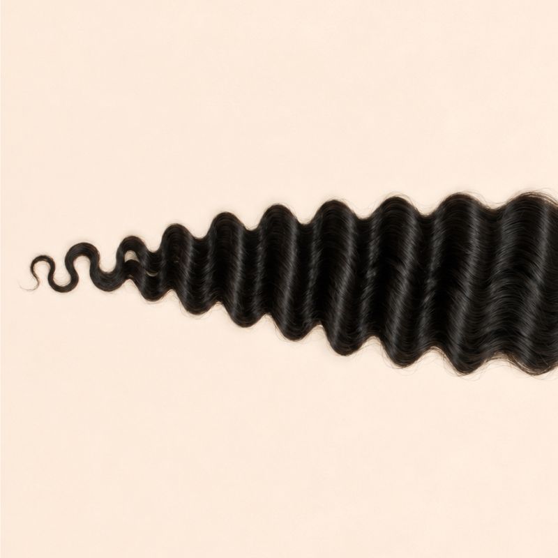 Narrow 2x6 transparent lace base with hair knotted by hand along the part