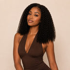 Natural black virgin jerry curl hair bundle laid flat showing full length