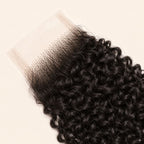 Glossy jerry curl coil on virgin human hair in a 2x6 transparent lace closure
