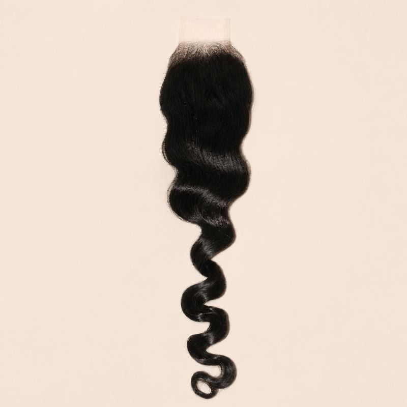 Narrow deep part closure in loose wave, two inches wide by six inches long