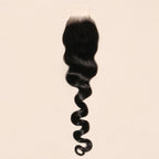 Narrow deep part closure in loose wave, two inches wide by six inches long