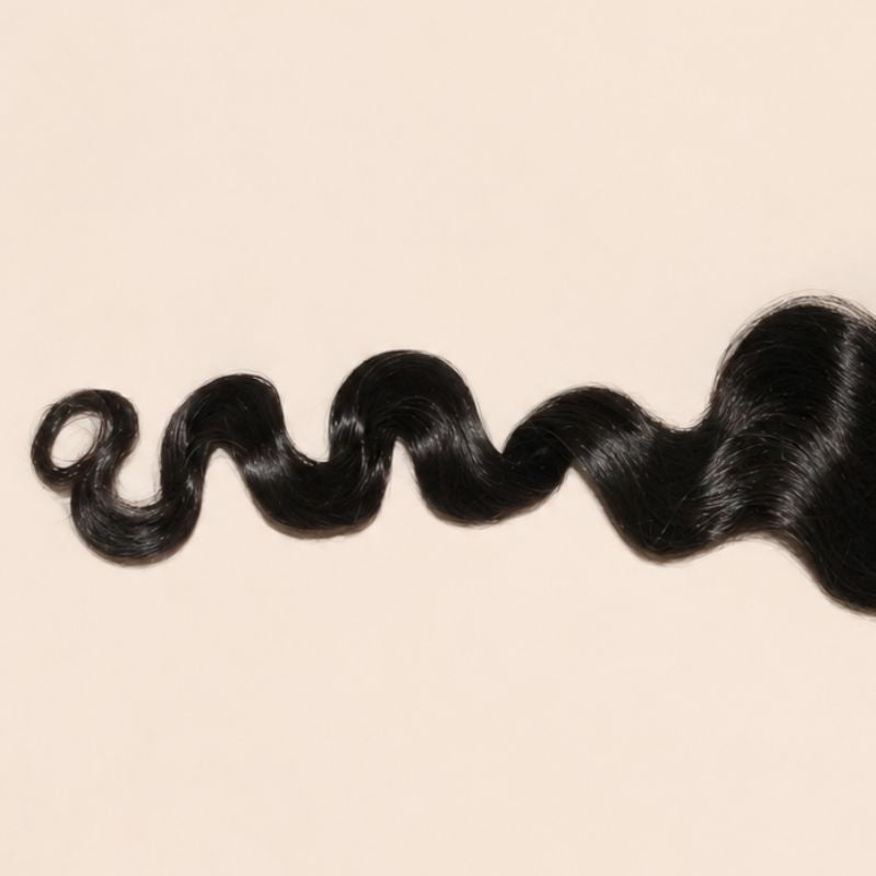 Transparent lace parting space running six inches front to back on a loose wave closure