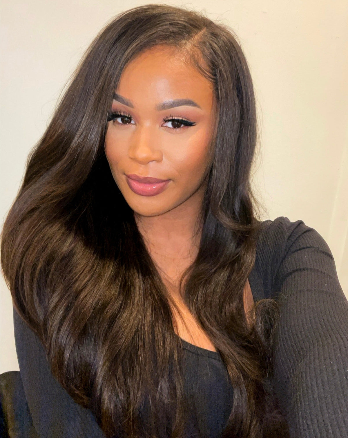 Close-up of the relaxed yaki straight texture on virgin Brazilian hair