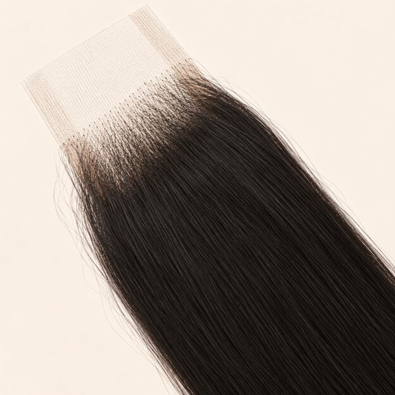 Yaki straight texture with the grain of pressed hair on a 2x6 lace closure