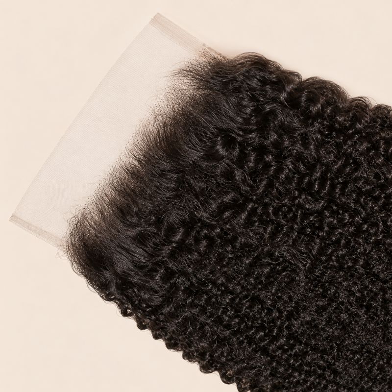 Close-up of the HD lace and parting on a Afro kinky curly 6x6 closure