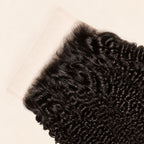 Close-up of the HD lace and parting on a Afro kinky curly 7x7 closure