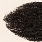 Close-up of the Afro kinky curly texture on a 7x7 HD lace closure