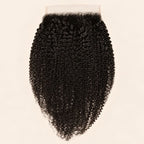 Afro kinky curly 7x7 HD lace closure in natural black, laid flat showing the full hair length