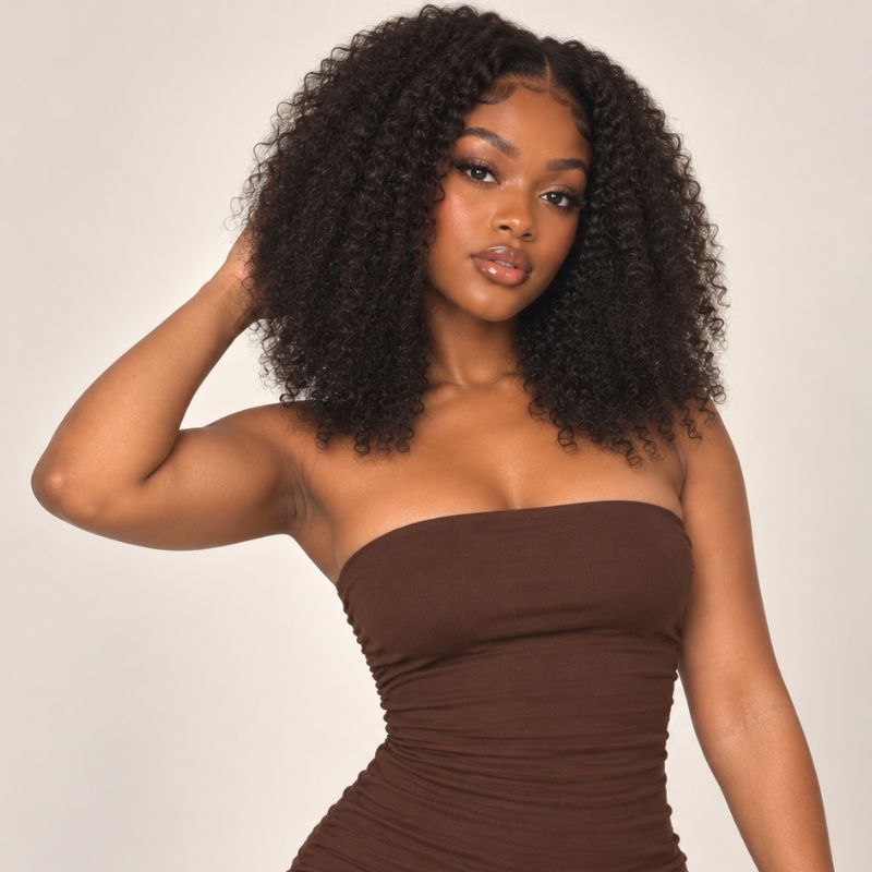 Model wearing Afro kinky curly clip-in hair extensions