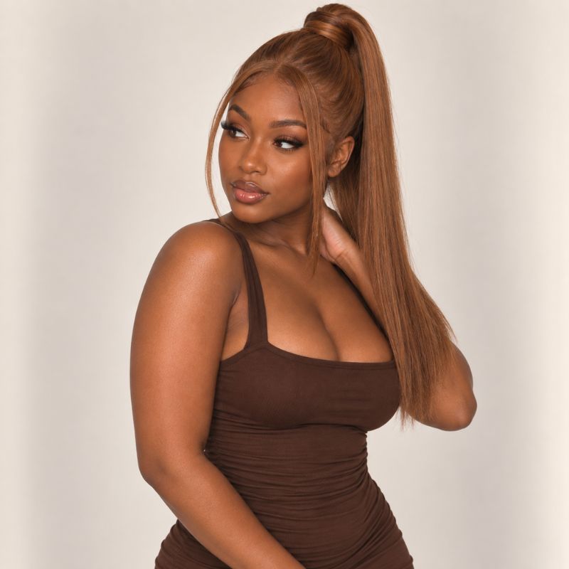 Model wearing a auburn ponytail extension, shown from another angle