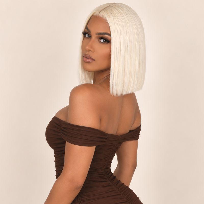 Model wearing a #613 blonde closure bob wig, shown from another angle