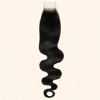 Body wave 2x6 HD lace closure in jet black, laid flat showing the full hair length