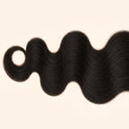 Close-up of the body wave texture on a 2x6 HD lace closure