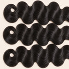 Three body wave wefts laid flat, showing the staggered lengths