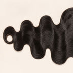 Close-up of the body wave texture on a 7x7 HD lace closure