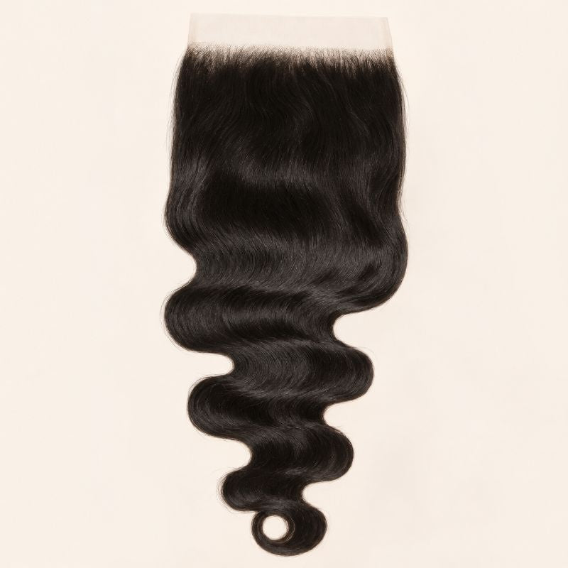 Body wave 7x7 HD lace closure in natural black, laid flat showing the full hair length