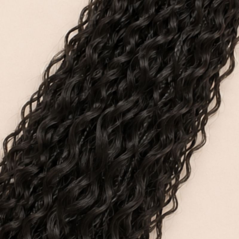 Close-up of the deep wave human hair curls on crochet boho braids