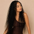 Model wearing crochet boho braids made with deep wave human hair curls