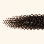 Close-up of the curly texture on a 2x6 HD lace closure