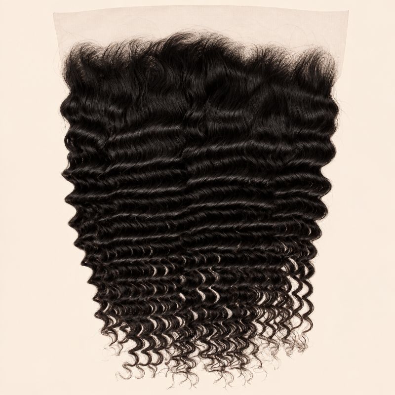 Deep wave 13x6 HD lace frontal in natural black, laid flat showing the full ear-to-ear lace