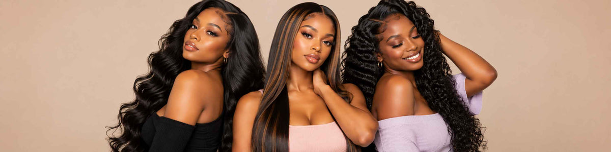 Three women modeling long, dark, wavy hair extensions or wig styles against a plain beige studio background.