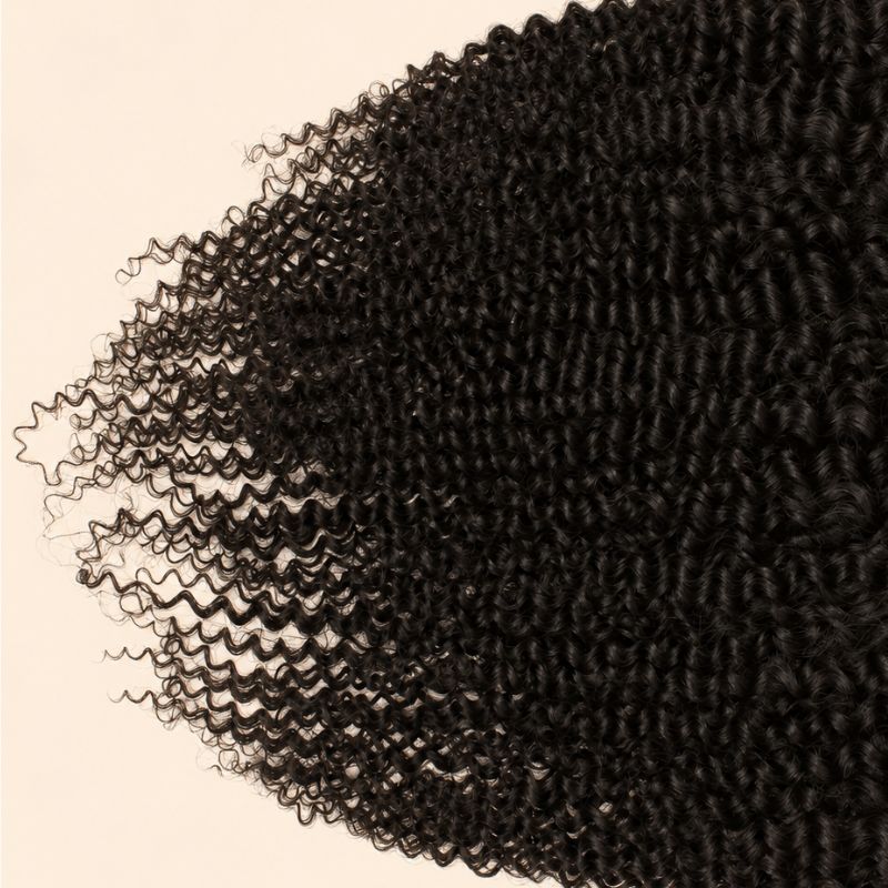 Close-up of the Jerry curl texture on a 13x6 HD lace frontal
