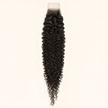 Jerry curl 2x6 HD lace closure in natural black, laid flat showing the full hair length