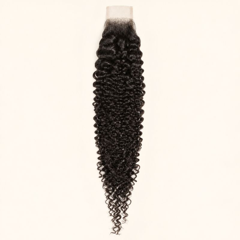 Jerry curl 2x6 HD lace closure in natural black, laid flat showing the full hair length